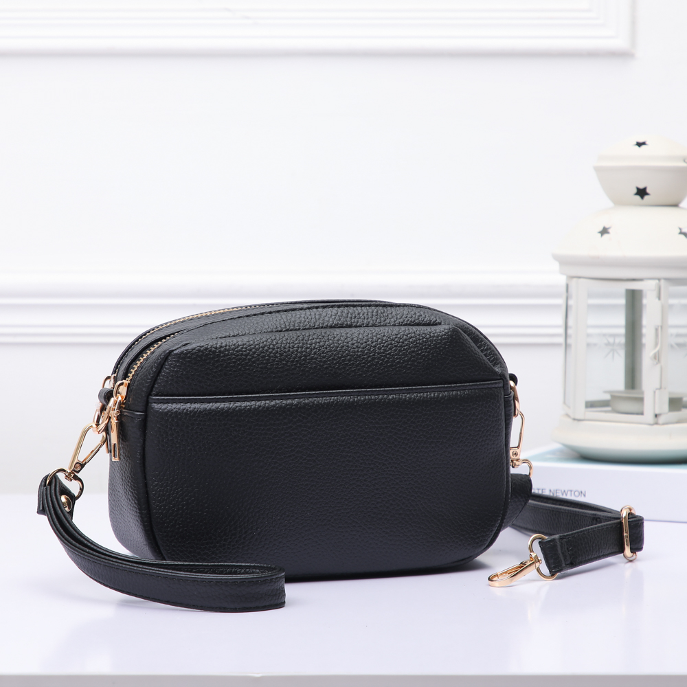 The Luna Petite Crossbody in Black-Lemons and Limes Boutique