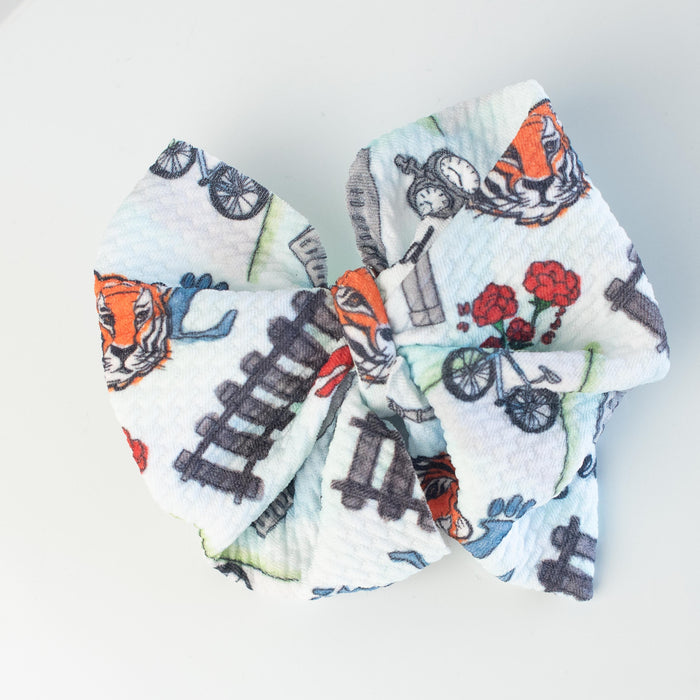 Loveland Exclusive Print Bow on Rust Free Clip