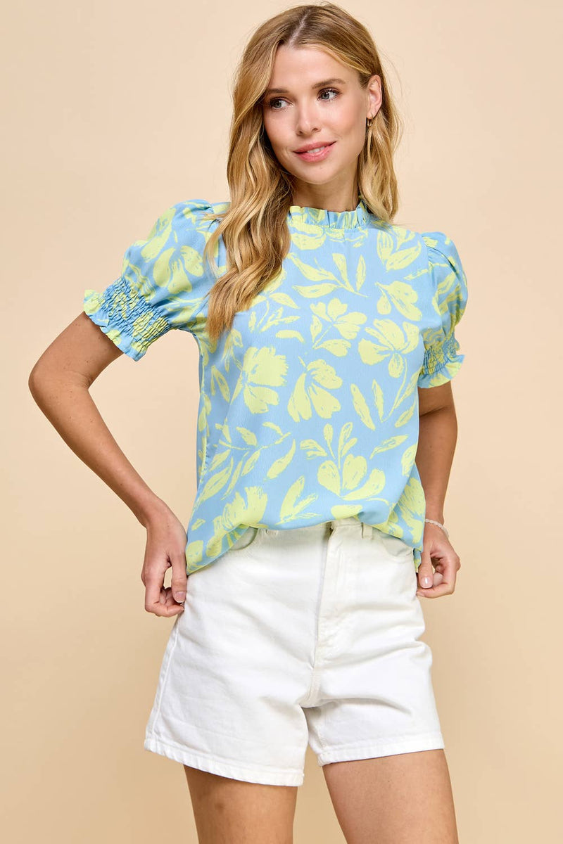 Floral Printed Top with Ruffled Neck Detail and Smocked Sleeve in Blue--Lemons and Limes Boutique