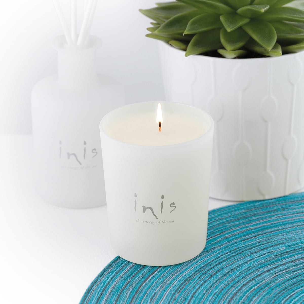 Scented Candle by Inis 6.7oz.