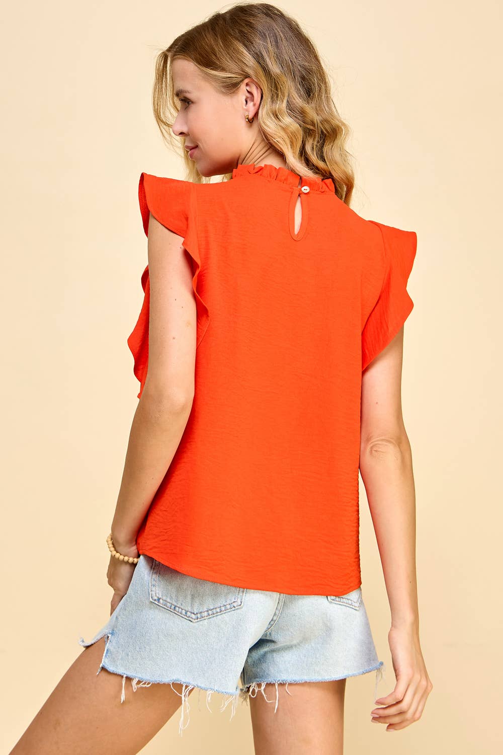 Solid Top with Ruffled Neck and Sleeves in Sunset-Lemons and Limes Boutique