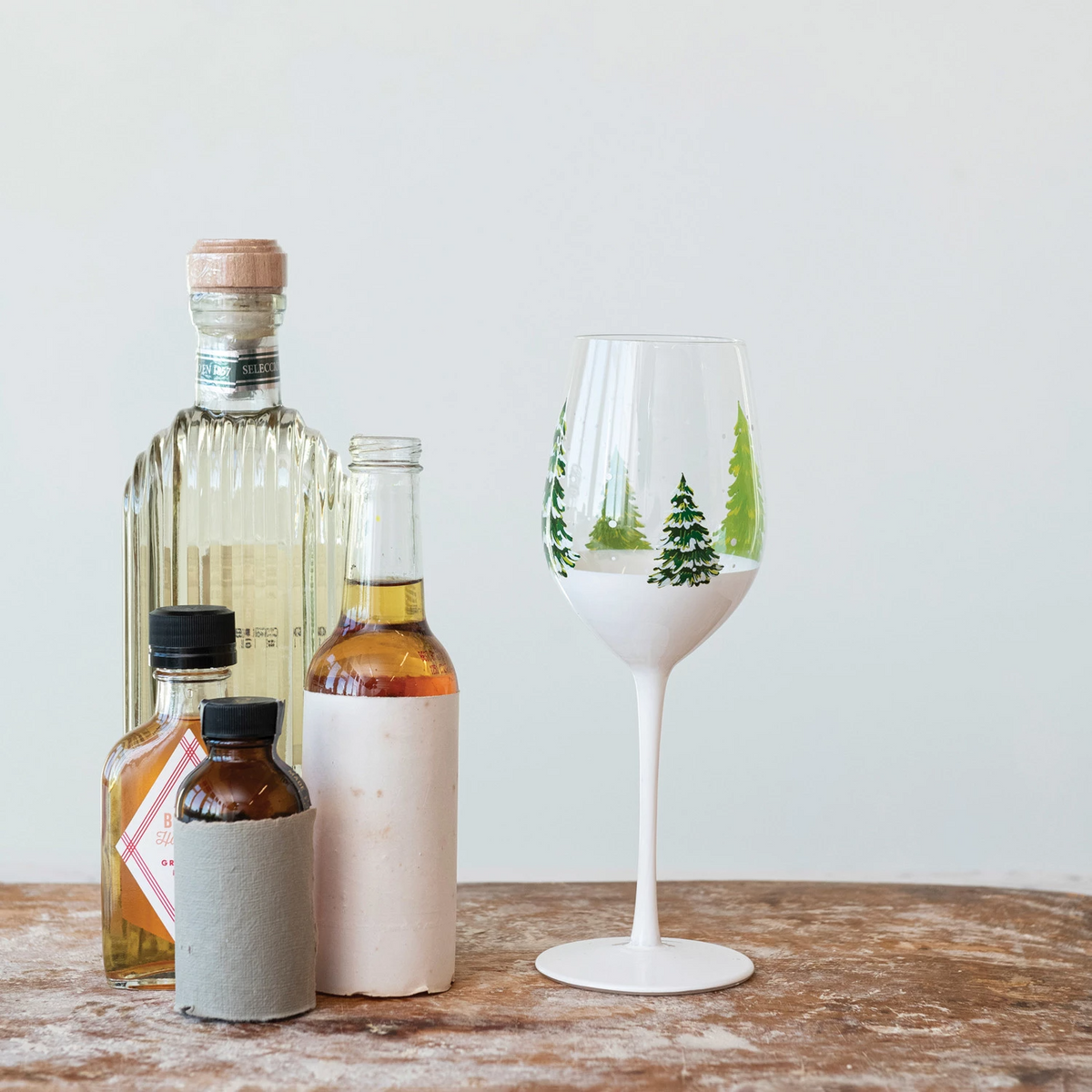 12 oz. Hand-Painted Stemmed Wine Glass w/ Trees & Snow, Green & White-Lemons and Limes Boutique