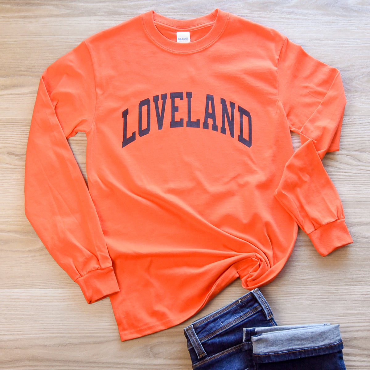 Loveland Curved Long Sleeve T-Shirt on Orange--Lemons and Limes Boutique