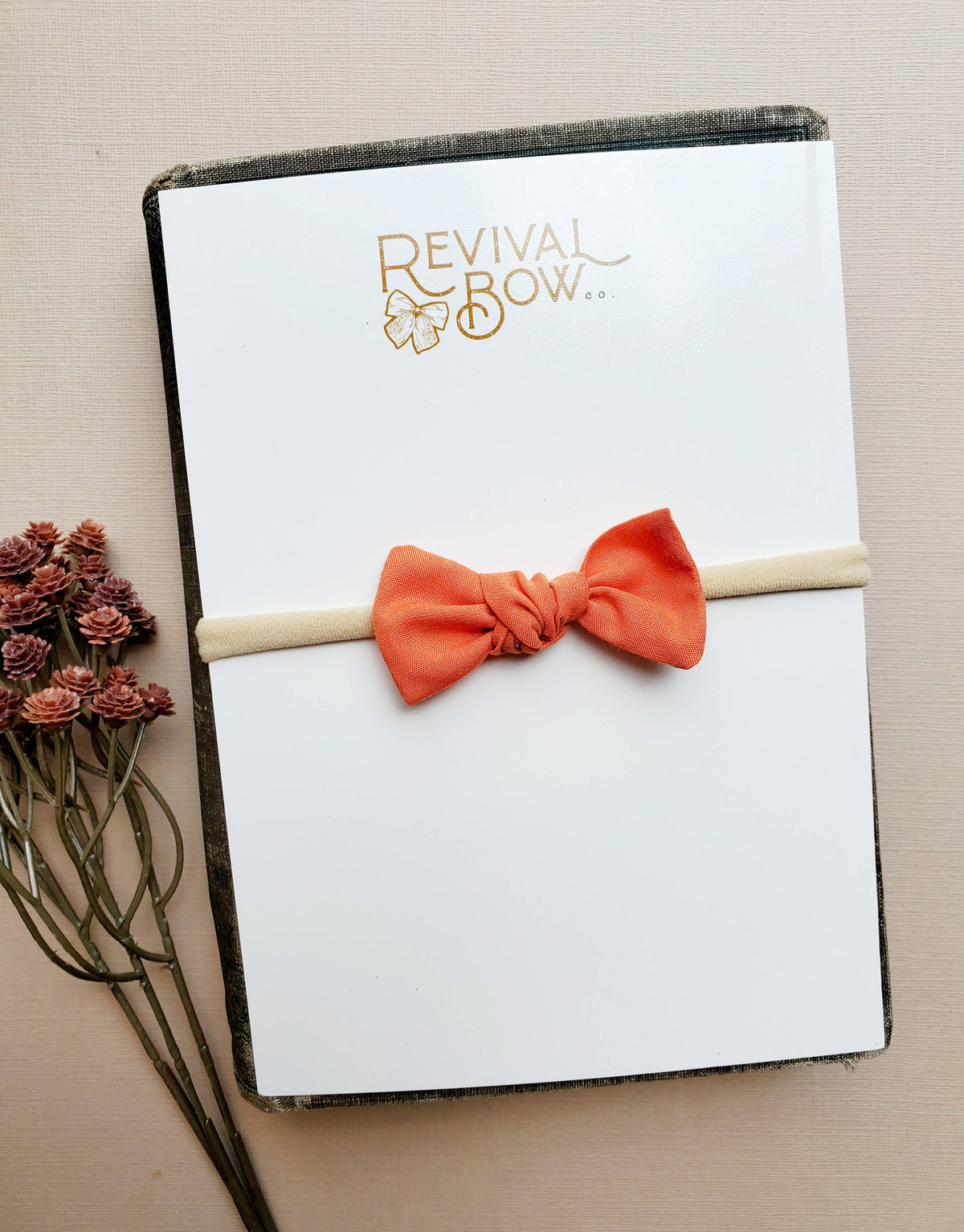 Newborn Knot Bow on Headband in Pumpkin Orange-Lemons and Limes Boutique