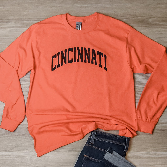 Cincinnati Black Curve Long Sleeve T-Shirt on Orange--Lemons and Limes Boutique