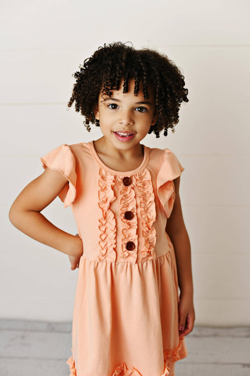 Kids Pastel Peach Ruffle Button Dress--Lemons and Limes Boutique