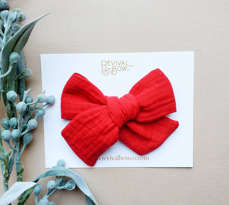 Christmas Bow on Clip in Holly Berry Gauze--Lemons and Limes Boutique